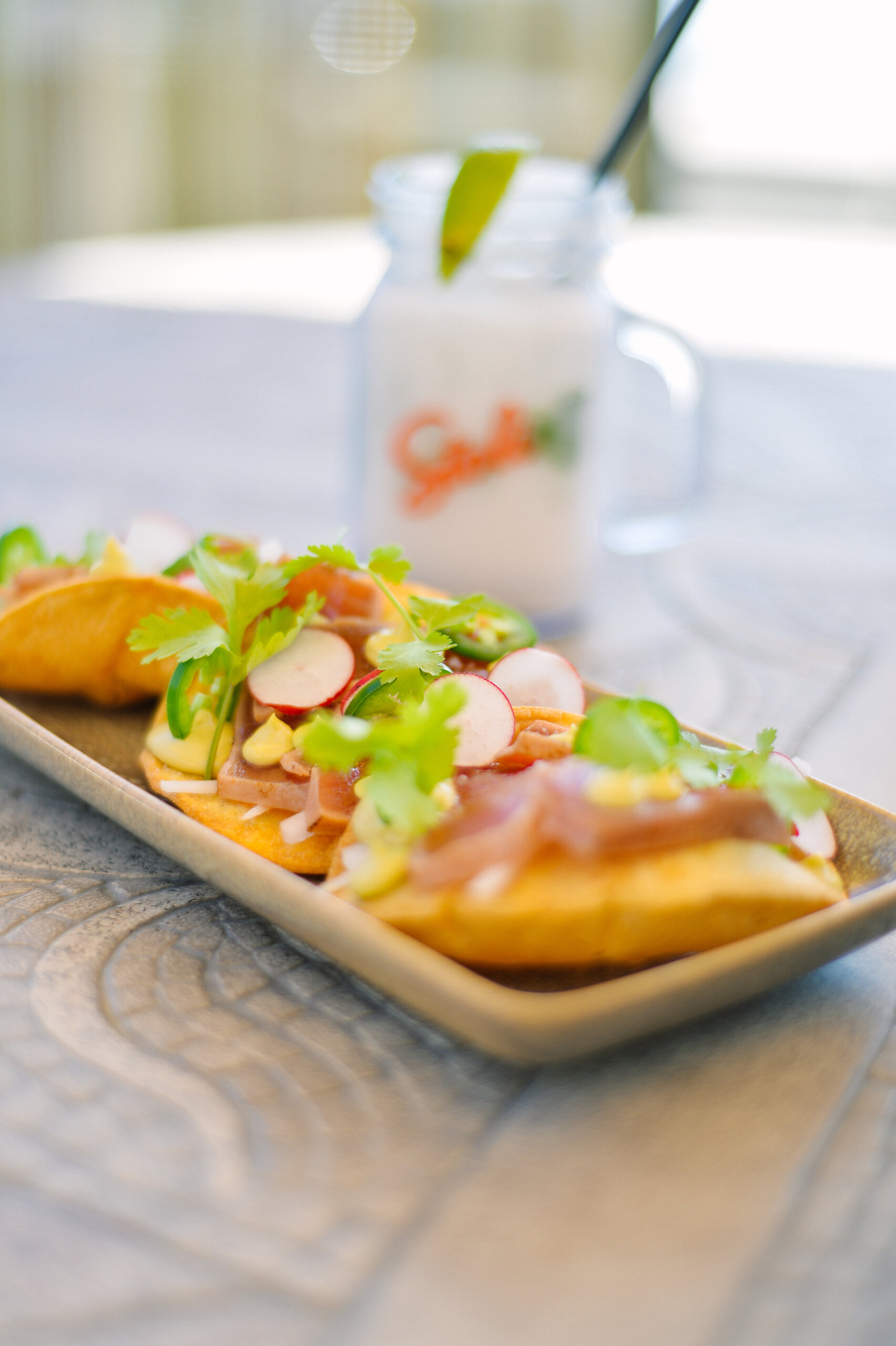 Poolside tacos and refreshing cocktail