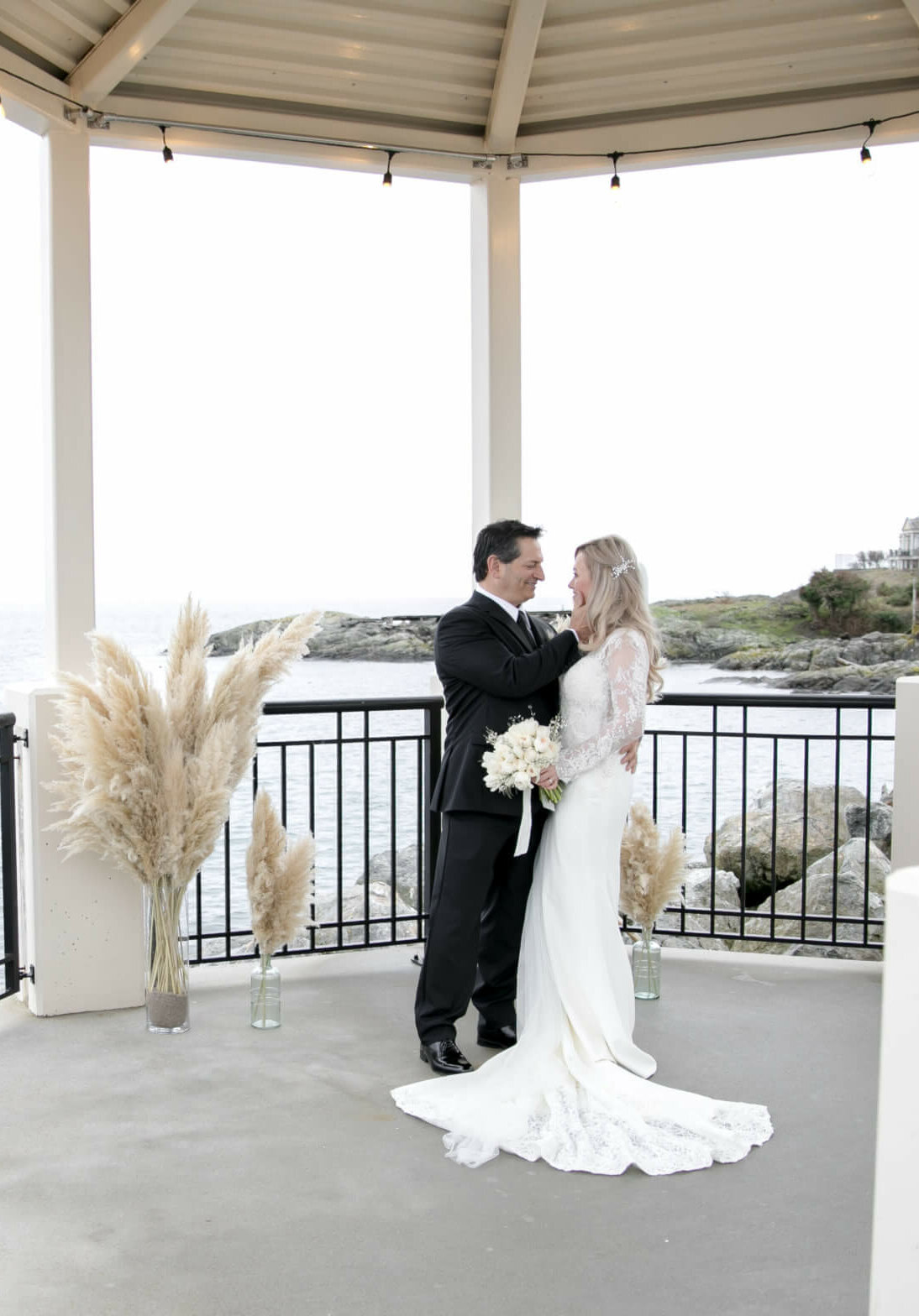 wedding couple married in fall ocean view gazebo outdoors