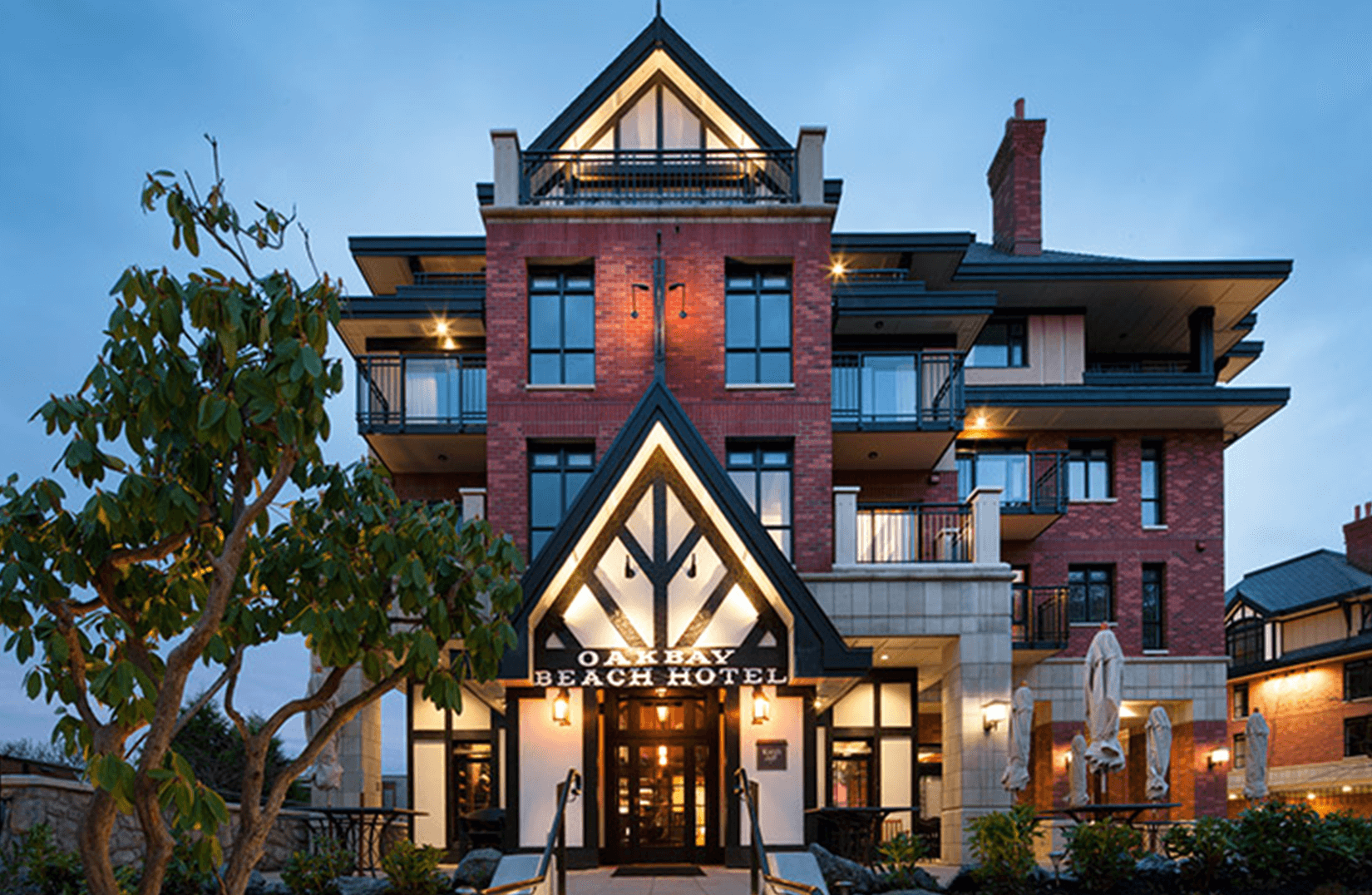 oak bay beach hotel exterior faro pizza at dusk