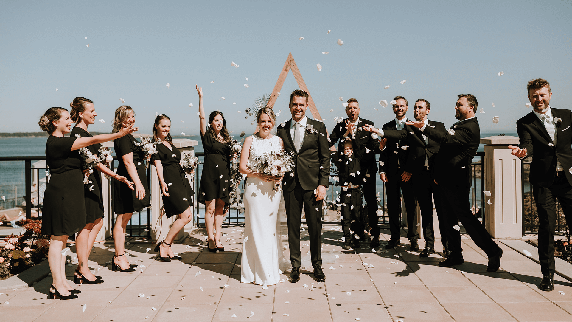 oak bay beach hotel weddings bride and groom ceremony wedding party celebrating